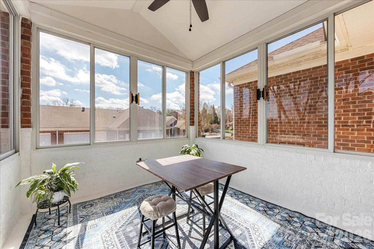 8368 Windsor Ridge Drive Charlotte, NC 28277 - Photo 12 of 46 a view of a workspace with furniture and a window