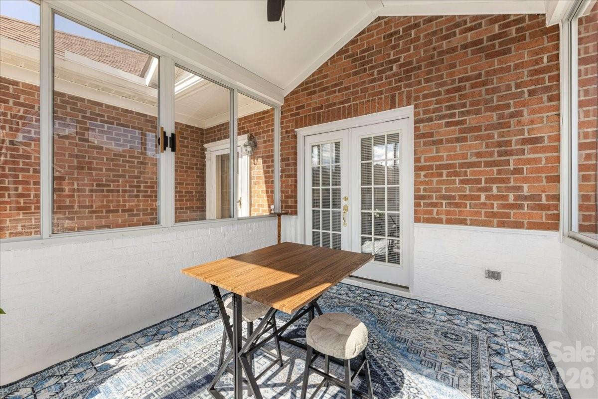 8368 Windsor Ridge Drive Charlotte, NC 28277 - Photo 13 of 46 a view of a dining room with furniture and wooden floor