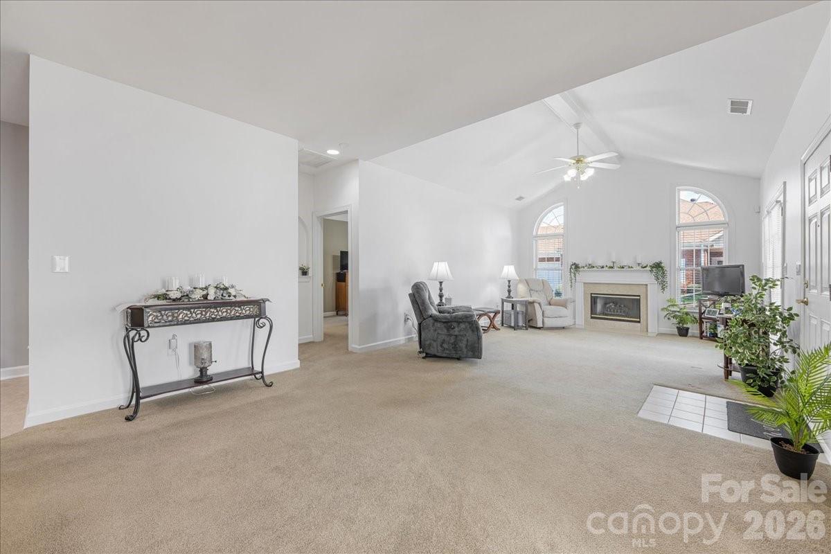 8368 Windsor Ridge Drive Charlotte, NC 28277 - Photo 16 of 46 a living room with furniture and a fireplace