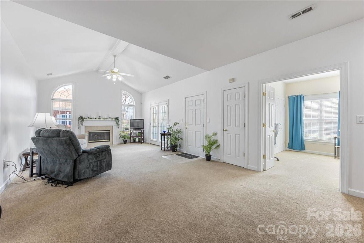 8368 Windsor Ridge Drive Charlotte, NC 28277 - Photo 17 of 46 a view of a livingroom with furniture and a fireplace