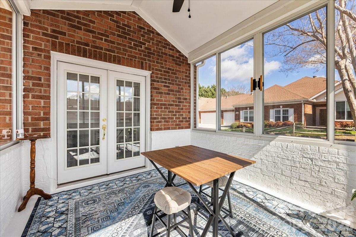 8368 Windsor Ridge Drive Charlotte, NC 28277 - Photo 2 of 46 a backyard of a house with table and chairs