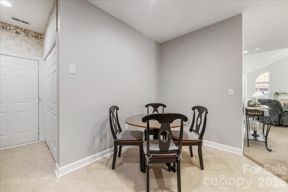 8368 Windsor Ridge Drive Charlotte, NC 28277 - Photo 23 of 46 a view of a dining room with furniture