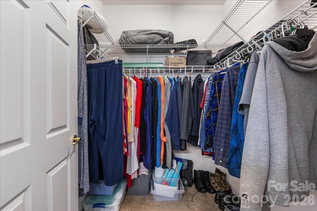 8368 Windsor Ridge Drive Charlotte, NC 28277 - Photo 26 of 46 a view of walk in closet with clothes