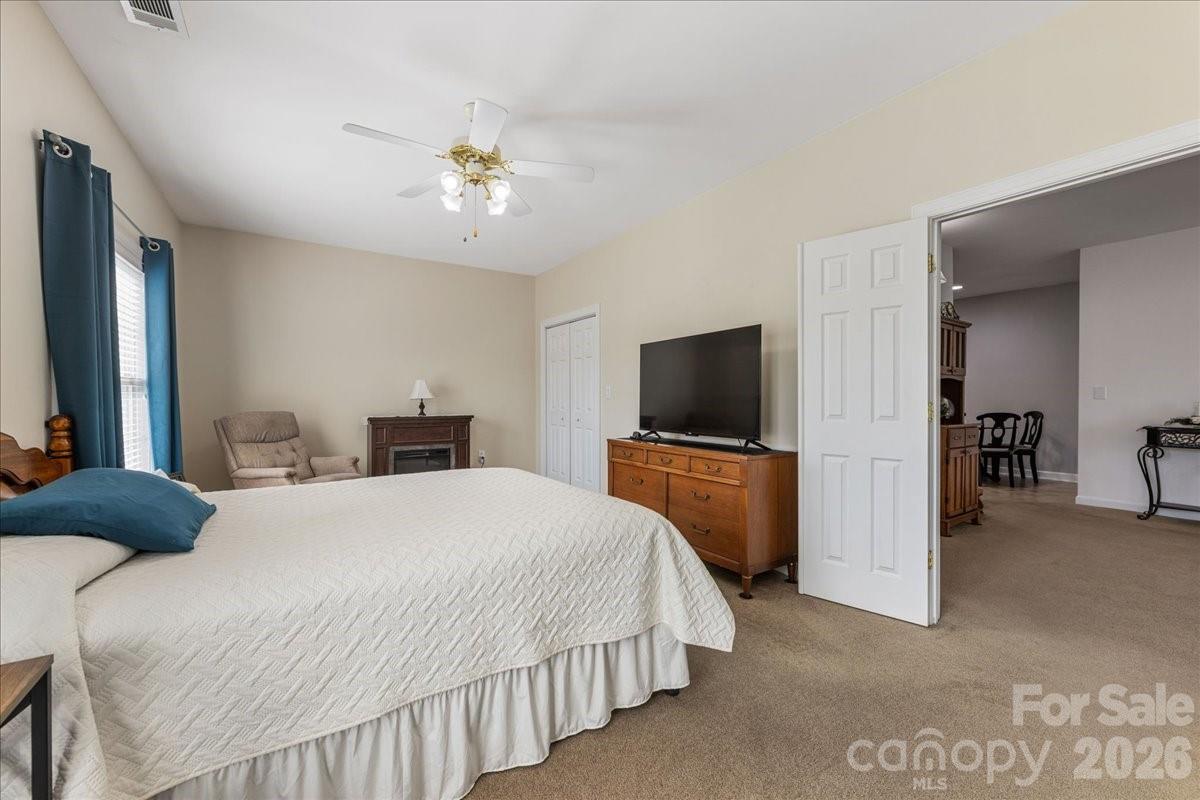 8368 Windsor Ridge Drive Charlotte, NC 28277 - Photo 32 of 46 a bedroom with a bed and a flat screen tv