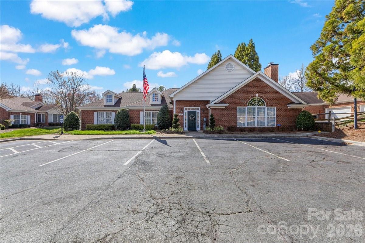 8368 Windsor Ridge Drive Charlotte, NC 28277 - Photo 37 of 46 a view of house with yard and trees in the background
