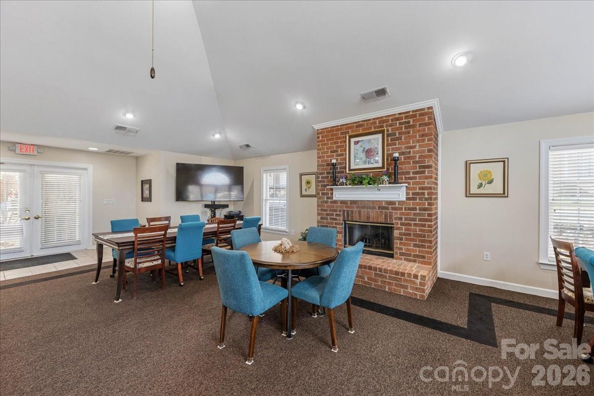 8368 Windsor Ridge Drive Charlotte, NC 28277 - Photo 39 of 46 a view of a dining room with furniture