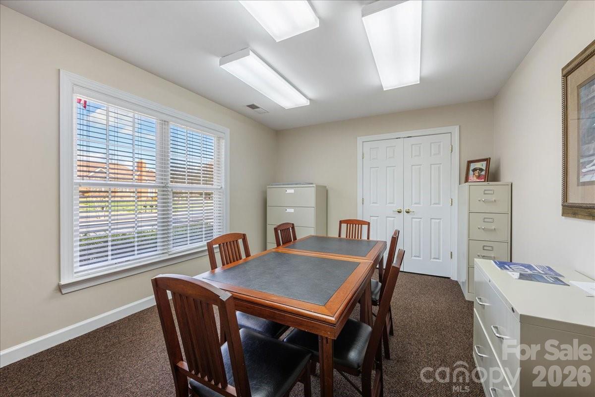 8368 Windsor Ridge Drive Charlotte, NC 28277 - Photo 41 of 46 a view of a dining room with furniture and window