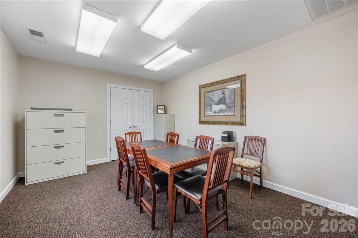 8368 Windsor Ridge Drive Charlotte, NC 28277 - Photo 42 of 46 a view of a dining room with furniture