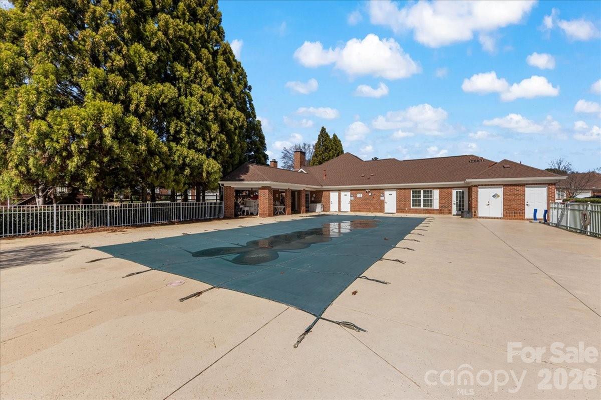 8368 Windsor Ridge Drive Charlotte, NC 28277 - Photo 45 of 46 a view of a white house with a yard