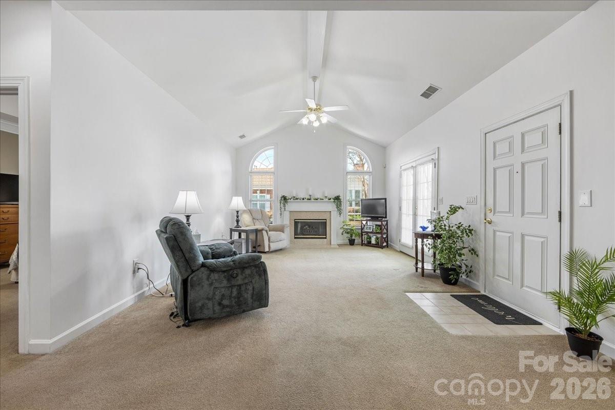 8368 Windsor Ridge Drive Charlotte, NC 28277 - Photo 7 of 46 a living room with furniture and a fireplace