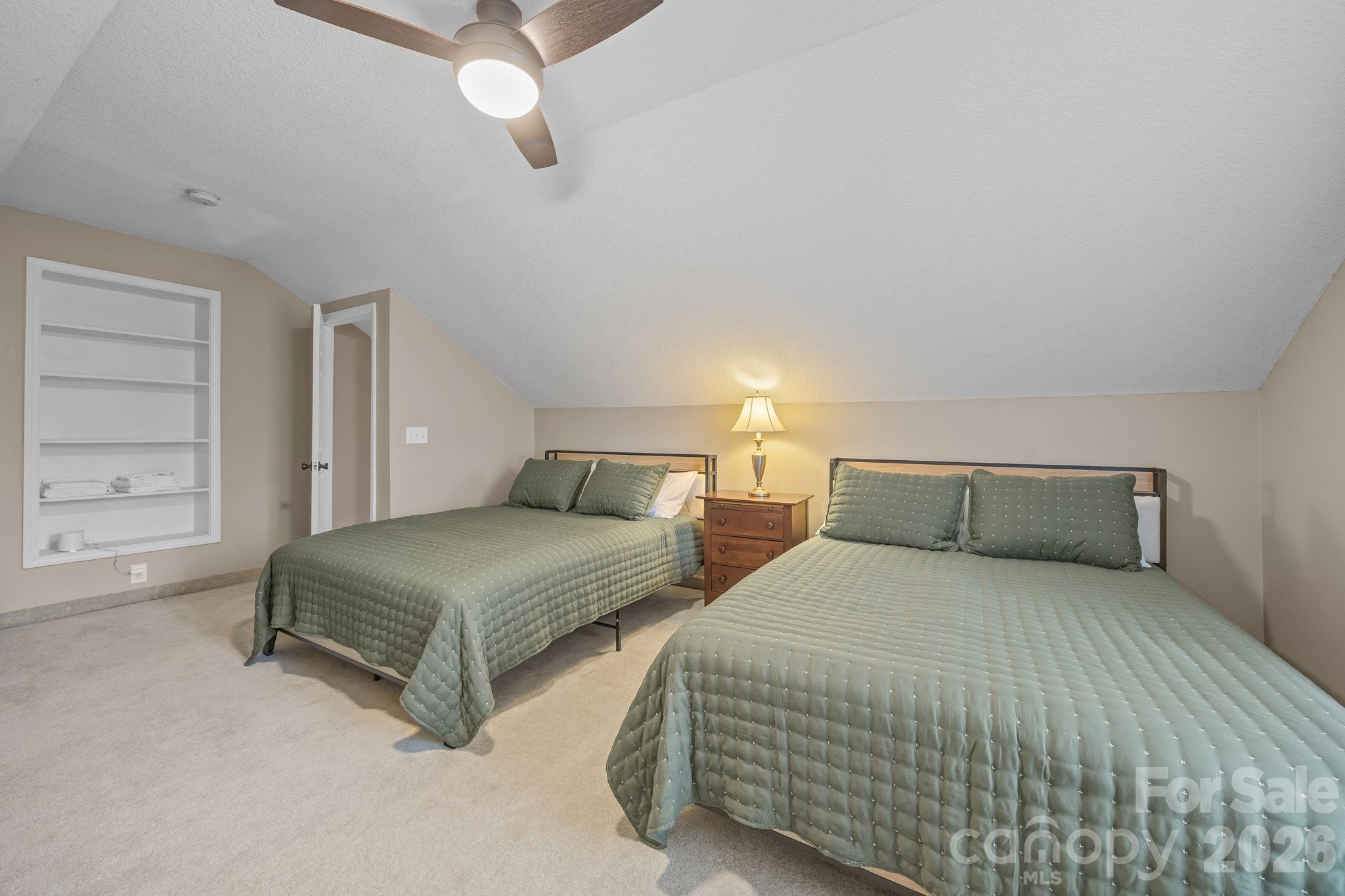 1870 Scout Road Salisbury, NC 28146 - Photo 38 of 48 a bedroom with two beds and painted walls