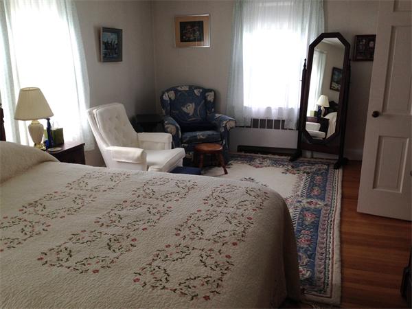 41 Longfellow Road Needham, MA 02494 - Photo 7 of 20 a bedroom with bed and wooden floor