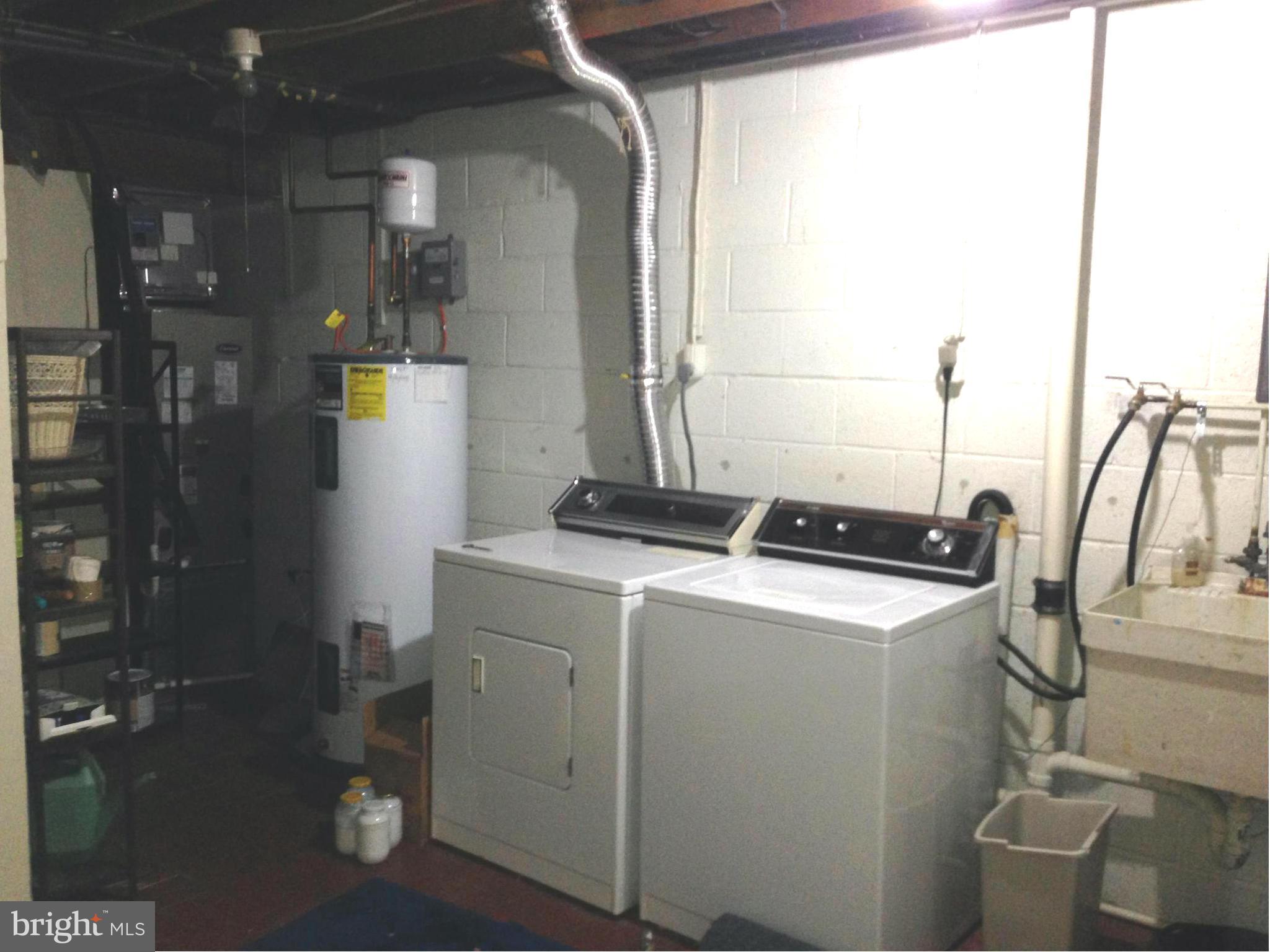 9325 Pan Ridge Road Baltimore, MD 21234 - Photo 18 of 20 a room with storage and utility