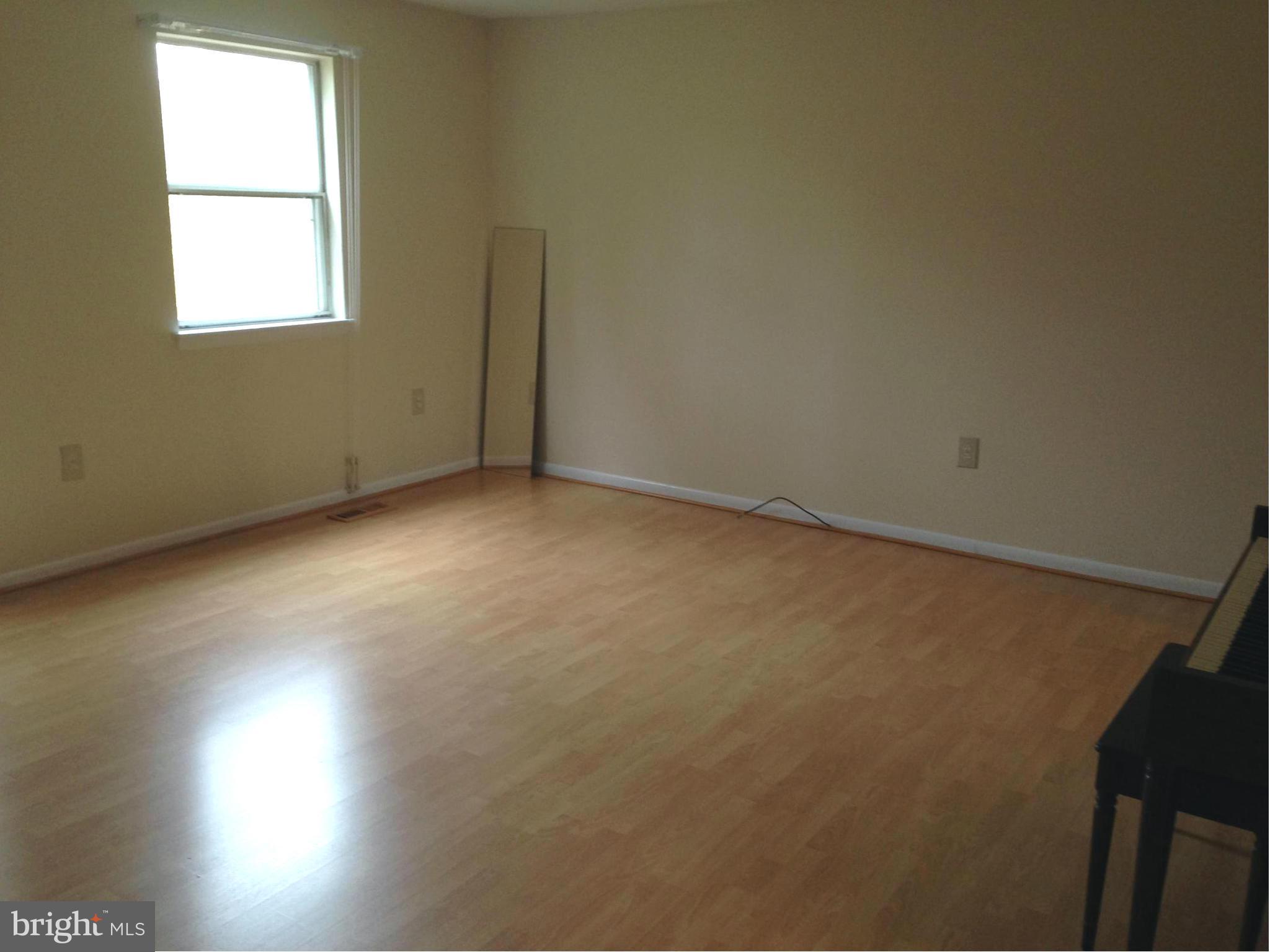 9325 Pan Ridge Road Baltimore, MD 21234 - Photo 6 of 20 an empty room with a window