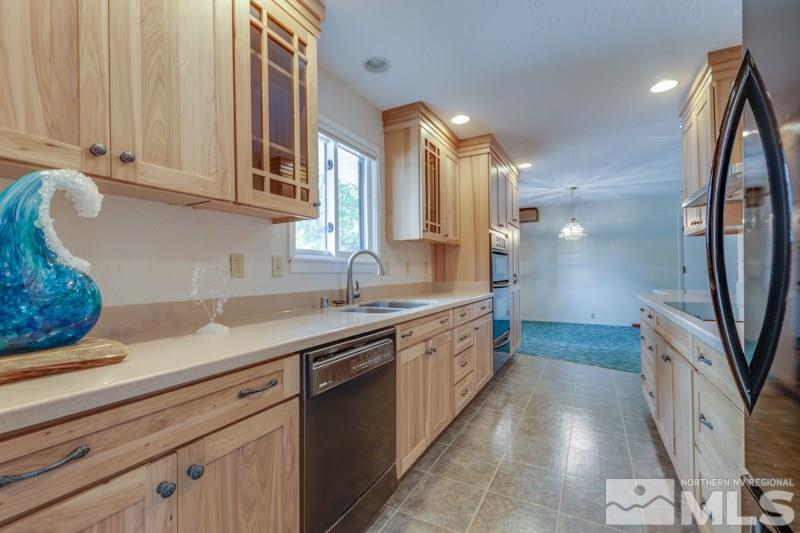 13935 Kewanna Trail Reno, NV 89521 - Photo 7 of 21 a spacious bathroom with a sink a mirror and a bathtub
