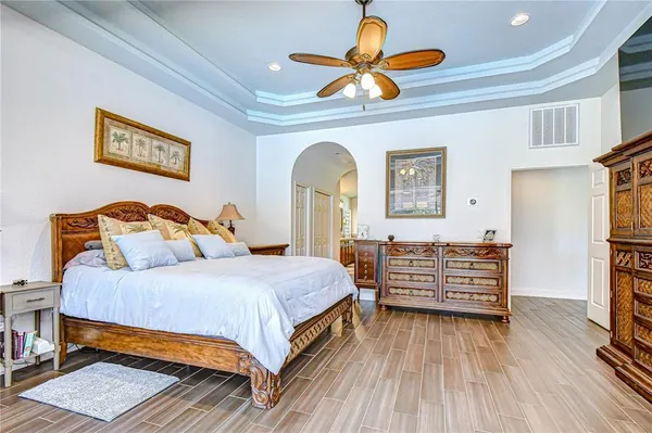 a bathroom with a granite countertop bathtub and a shower