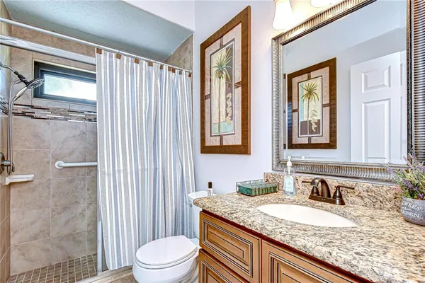 a view of a backyard with swimming pool