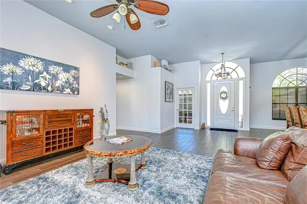 a white toilet sitting next to a bathroom sink