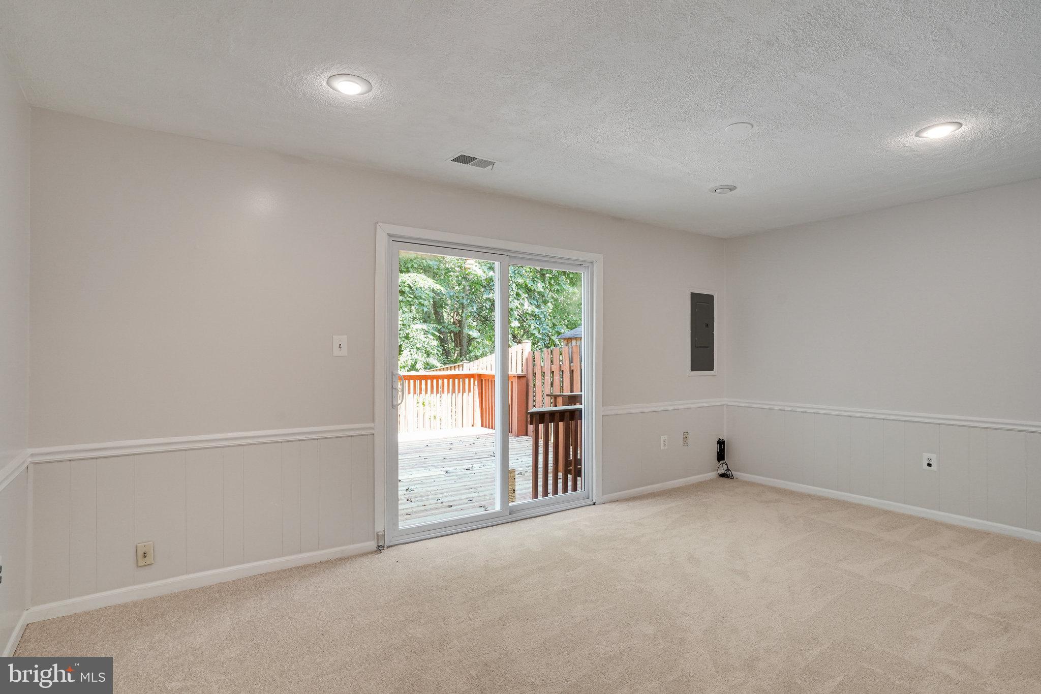 7918 Pebble Brook Court Springfield, VA 22153 - Photo 21 of 28 a view of an empty room with a window