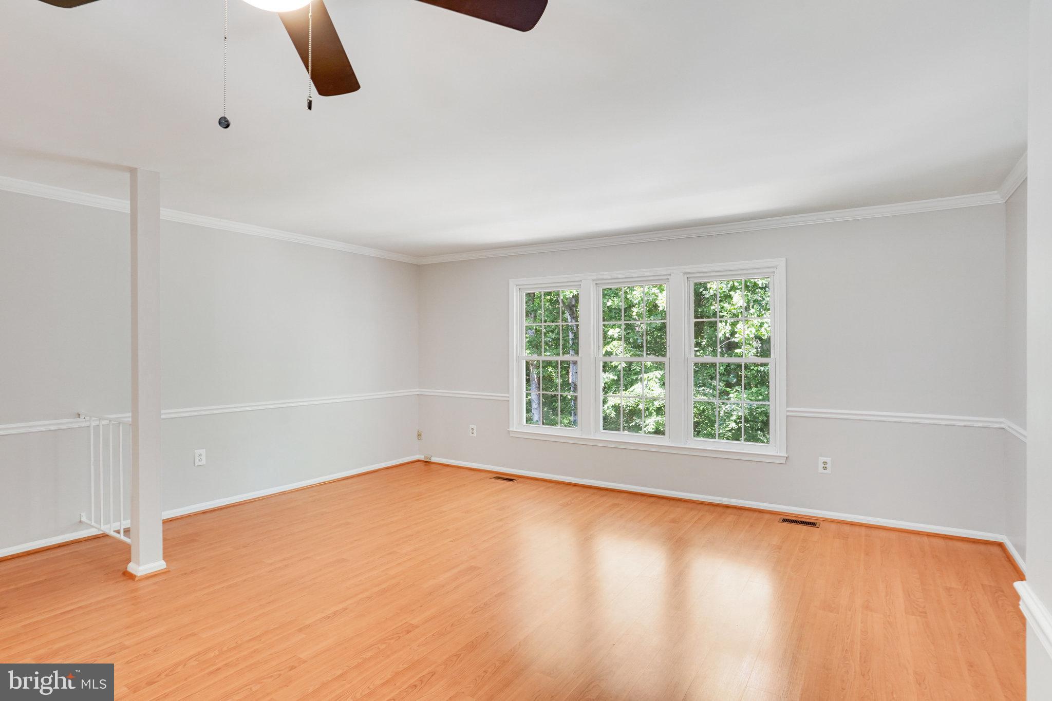 7918 Pebble Brook Court Springfield, VA 22153 - Photo 8 of 28 an empty room with windows