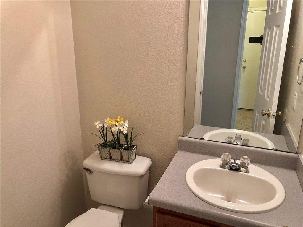 121 Ansleys Way Kyle, TX 78640 - Photo 11 of 39 primary bedroom and bath are downstairs along with this 1/2 bath