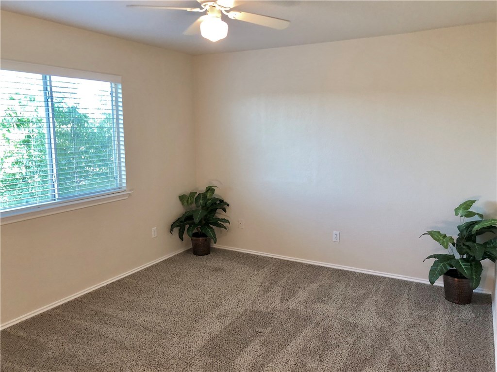 121 Ansleys Way Kyle, TX 78640 - Photo 30 of 39 upstairs bedroom 2