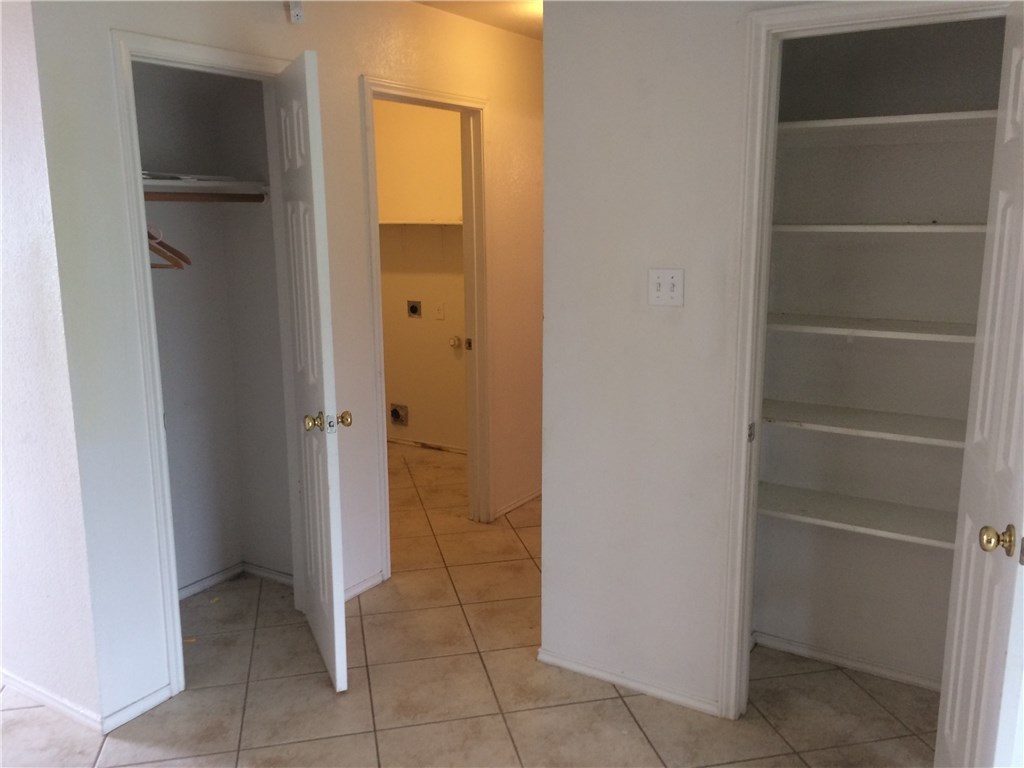121 Ansleys Way Kyle, TX 78640 - Photo 5 of 39 coat closet, pantry, laundry room