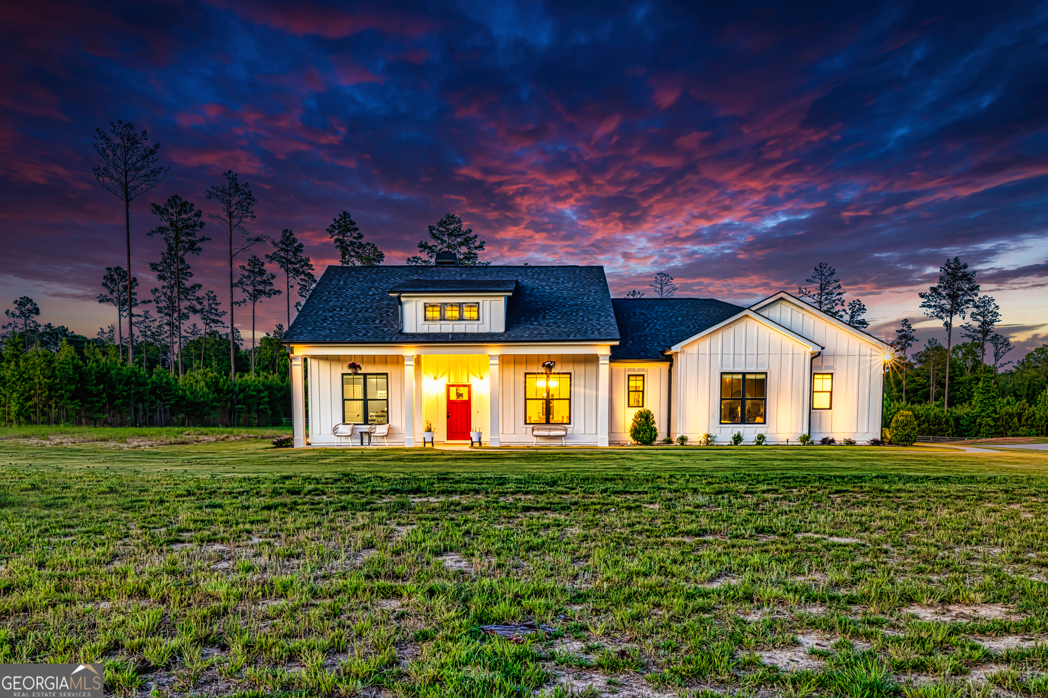 11084 Mt Carmel Road Senoia, GA 30276 - Photo 106 of 136 a front view of a house with a big yard