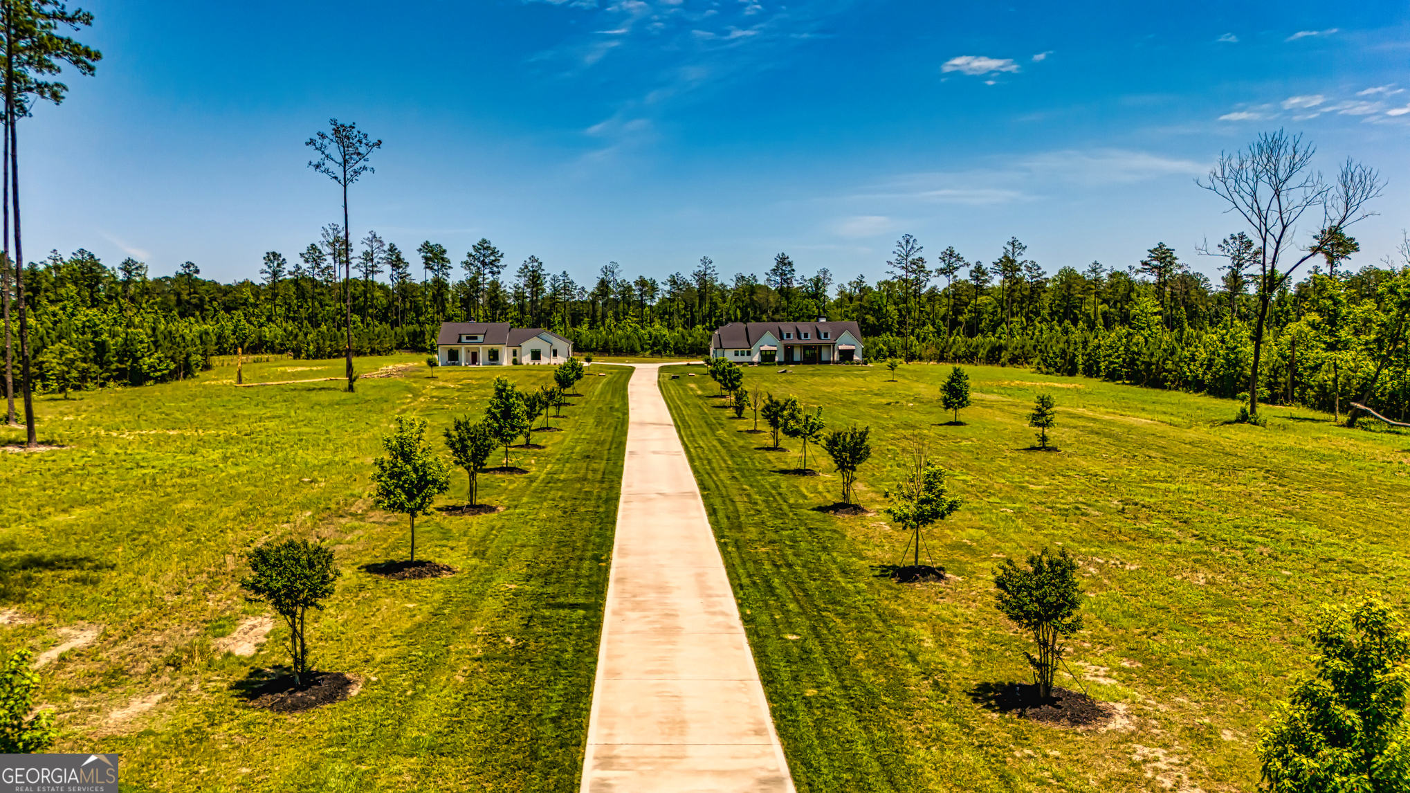 11084 Mt Carmel Road Senoia, GA 30276 - Photo 121 of 136 a view of a swimming pool with an outdoor space and seating area