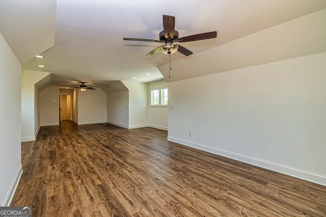 a front view of a house with a big yard