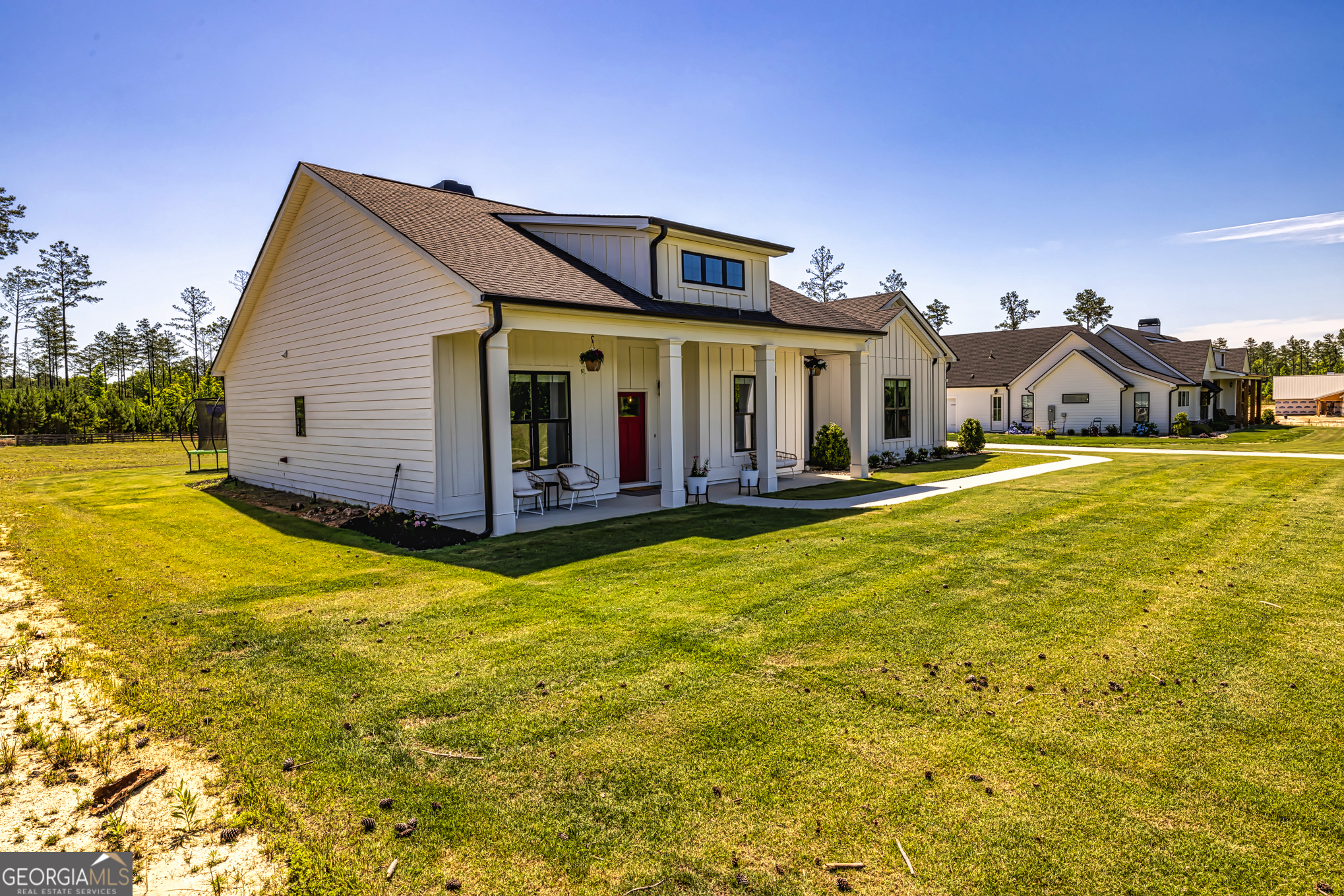11084 Mt Carmel Road Senoia, GA 30276 - Photo 67 of 136 a view of a house with a yard