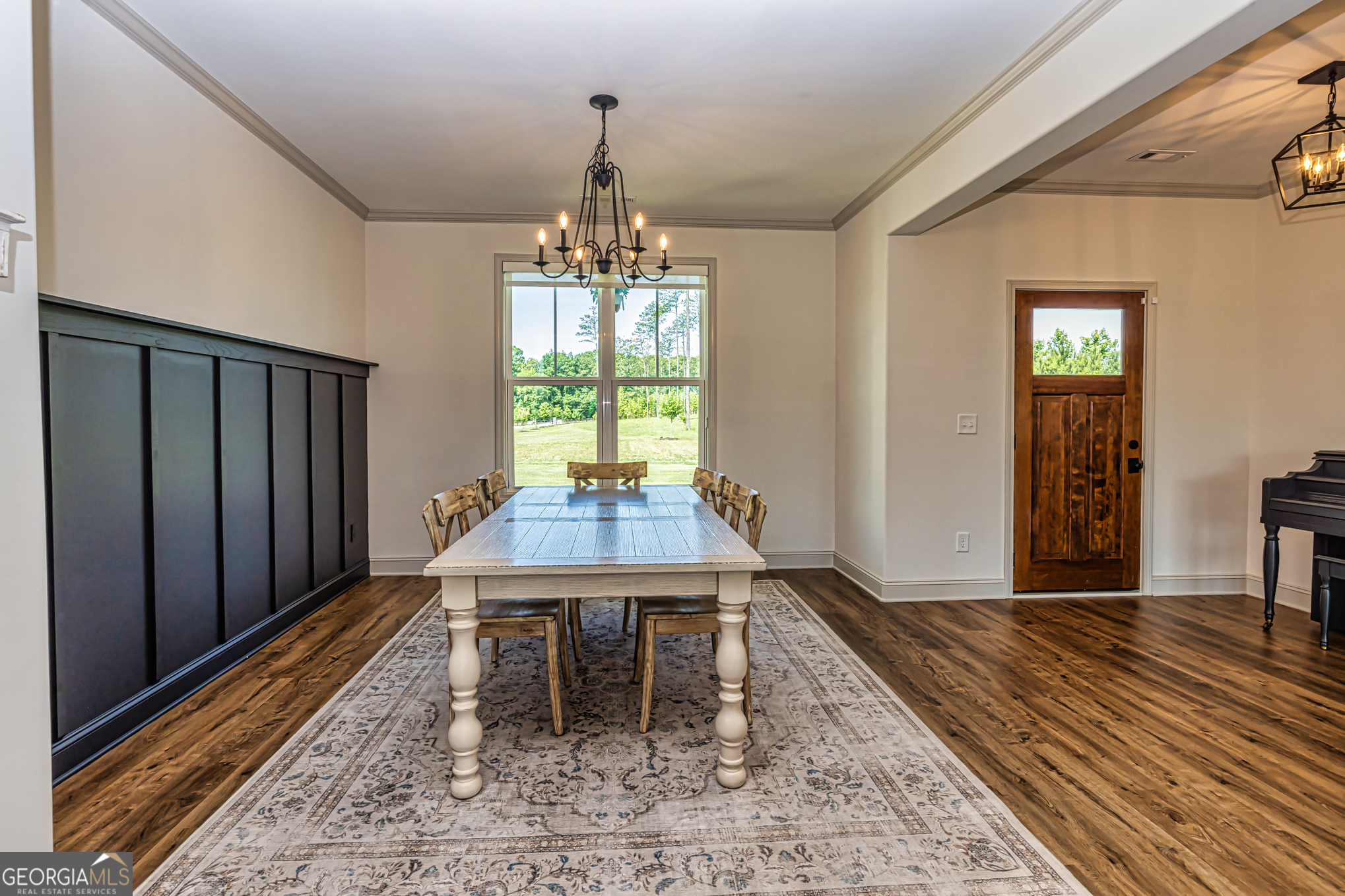 11084 Mt Carmel Road Senoia, GA 30276 - Photo 74 of 136 a view of a room with furniture window and wooden floor