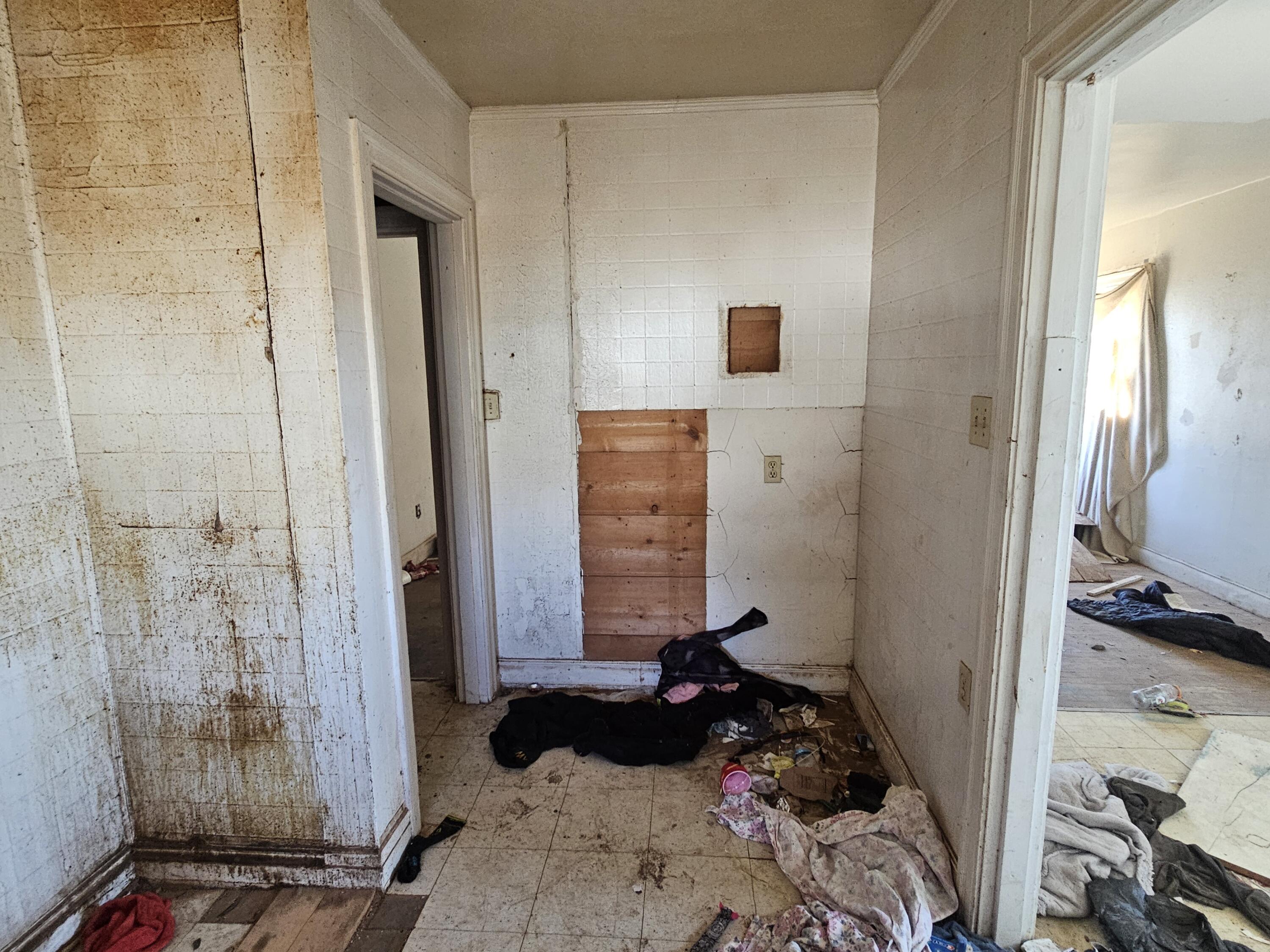 1514 18th Street Lubbock, TX 79401 - Photo 22 of 47 a bedroom with a bed and a mirror