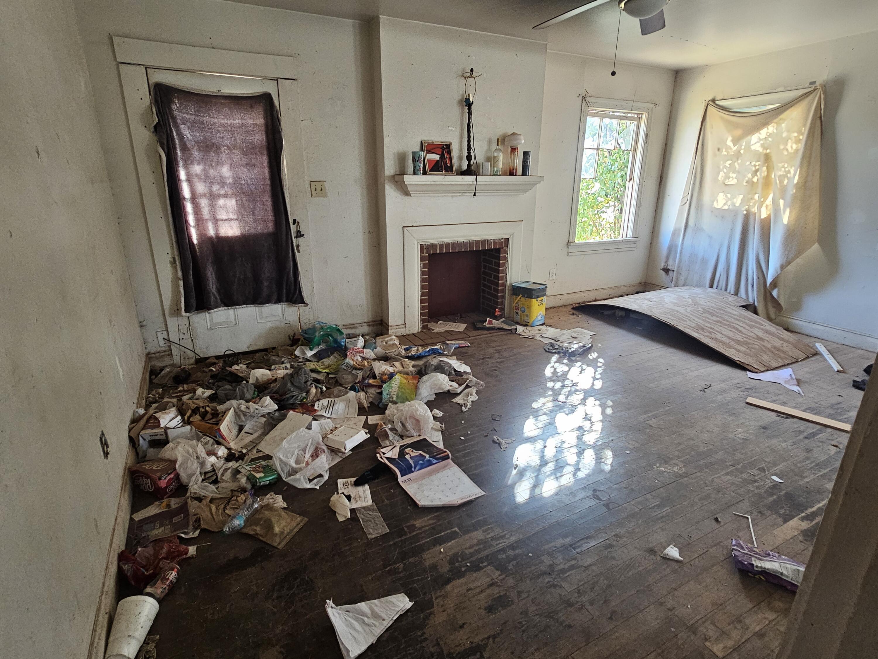 1514 18th Street Lubbock, TX 79401 - Photo 28 of 47 a view of a livingroom with furniture window and wooden floor