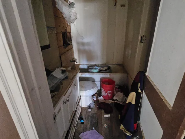 a view of a hallway with windows