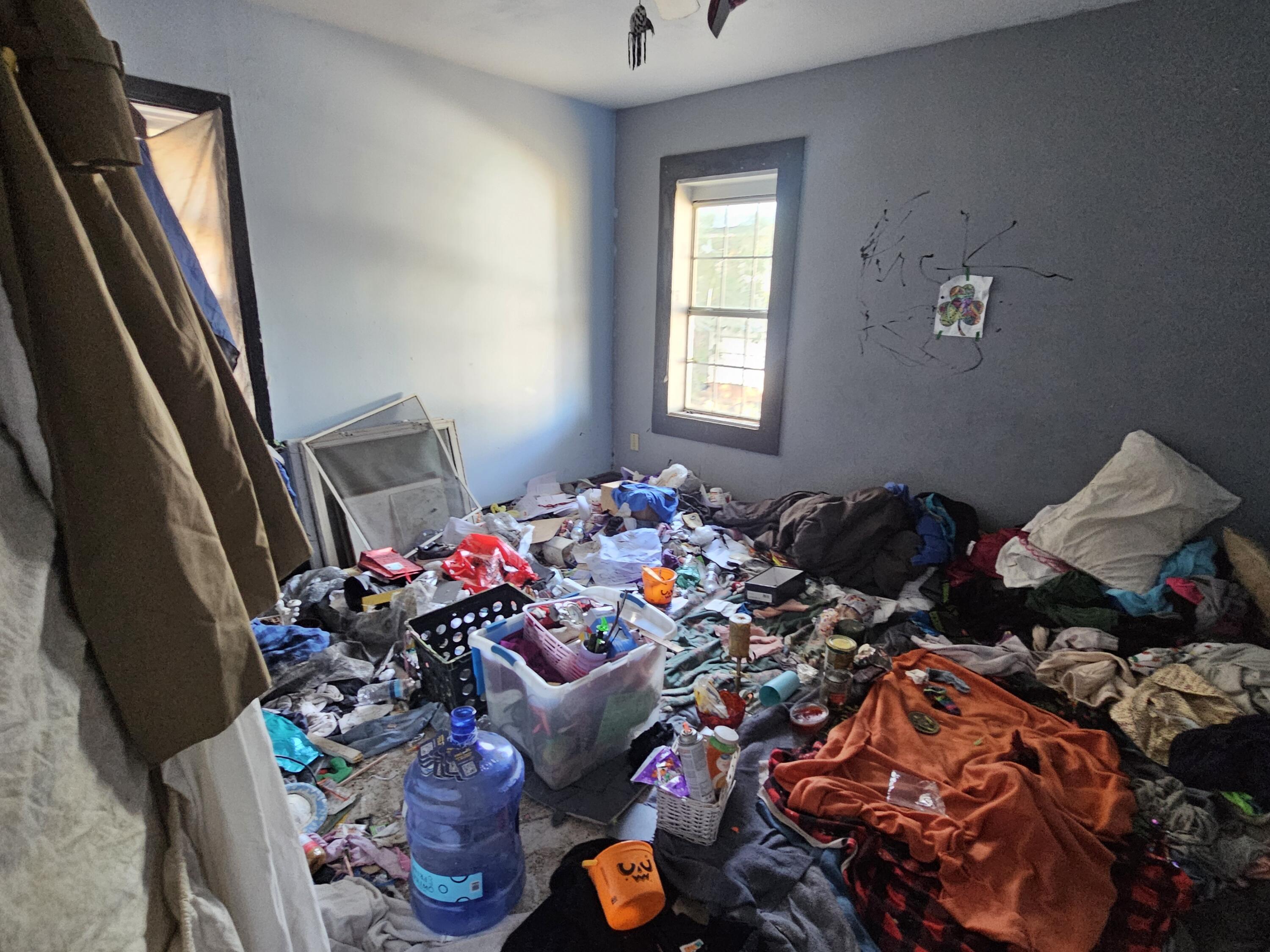 1514 18th Street Lubbock, TX 79401 - Photo 32 of 47 a very nice looking bedroom with many windows