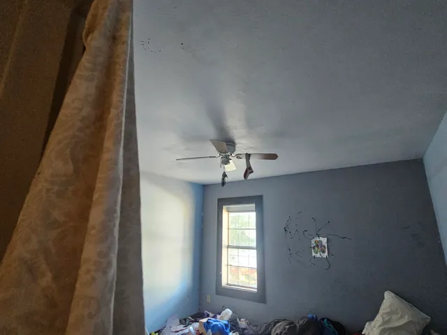 a view of a hallway with closet