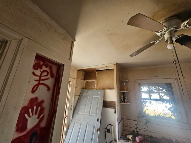 a view of a lake with a house