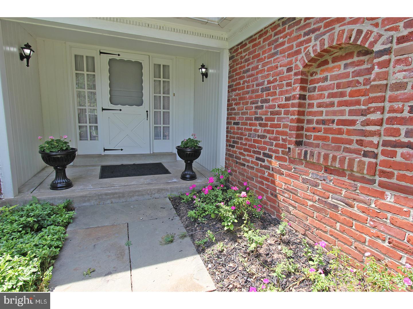 1664 Weedon Road Wayne, PA 19087 - Photo 2 of 24 a view of a backyard with sitting area