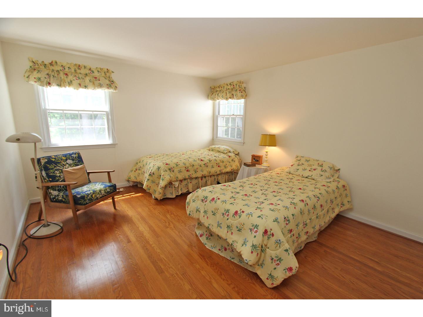 1664 Weedon Road Wayne, PA 19087 - Photo 21 of 24 a bedroom with two beds and a desk