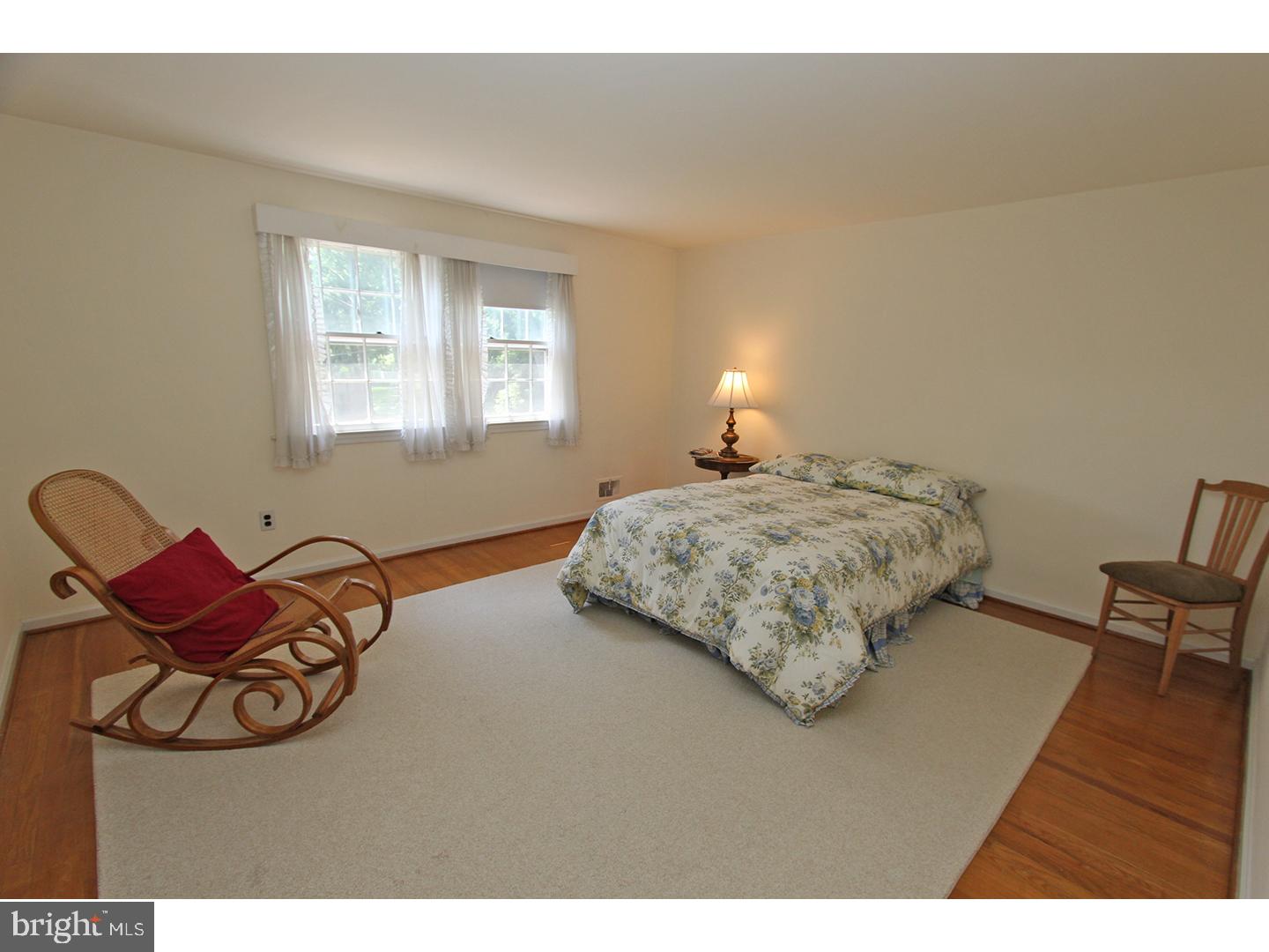 1664 Weedon Road Wayne, PA 19087 - Photo 22 of 24 a bedroom with a bed a dresser and chair