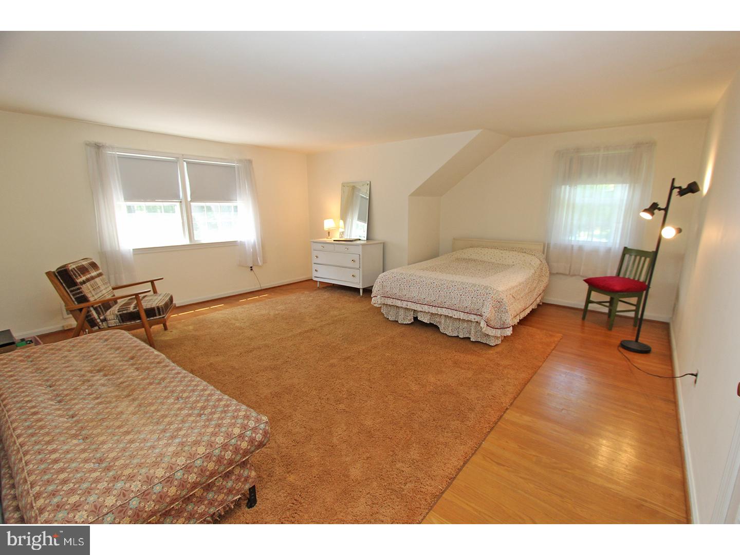 1664 Weedon Road Wayne, PA 19087 - Photo 23 of 24 a bedroom with a bed and window