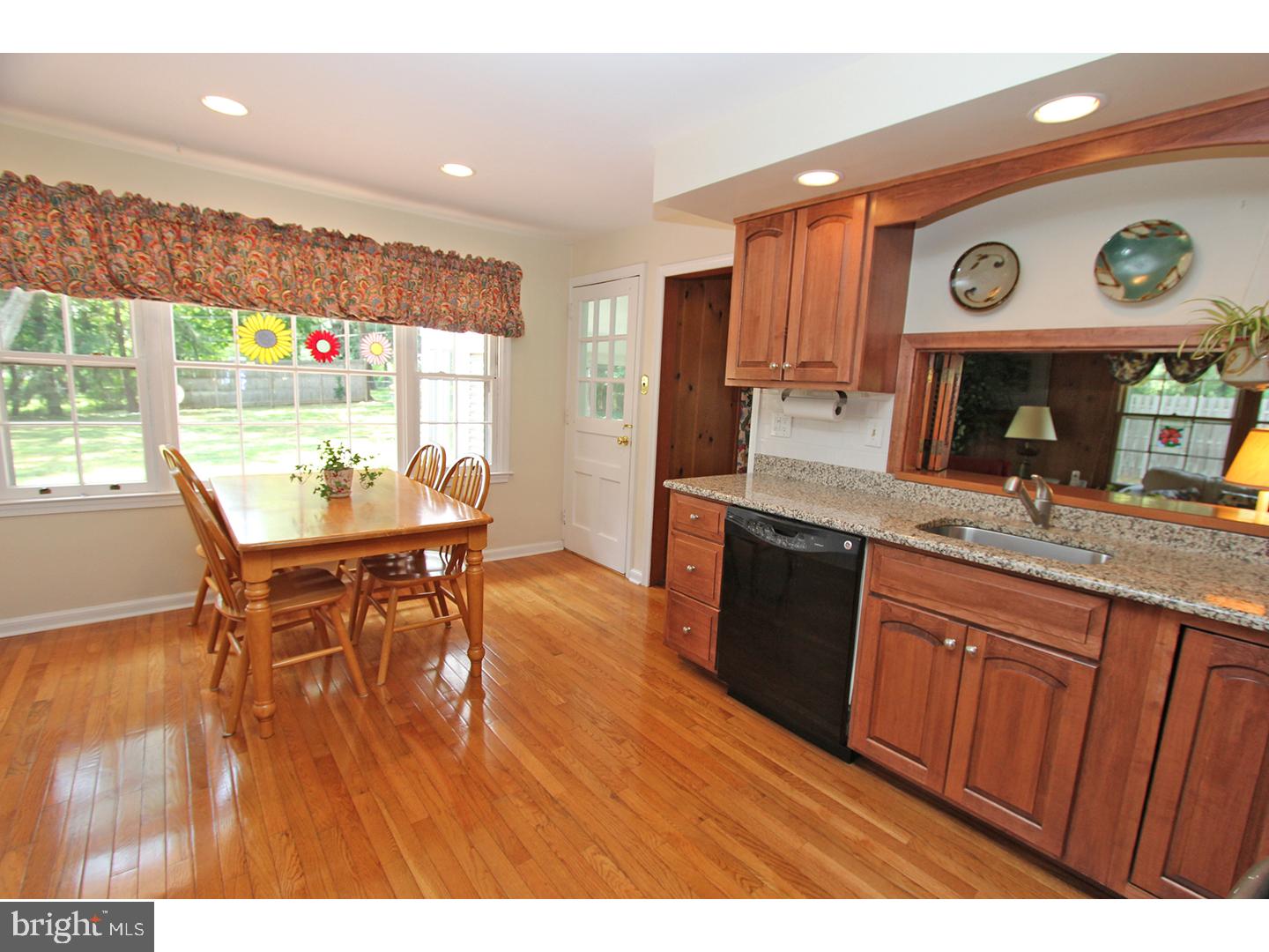 1664 Weedon Road Wayne, PA 19087 - Photo 7 of 24 a kitchen with a table and chairs in it