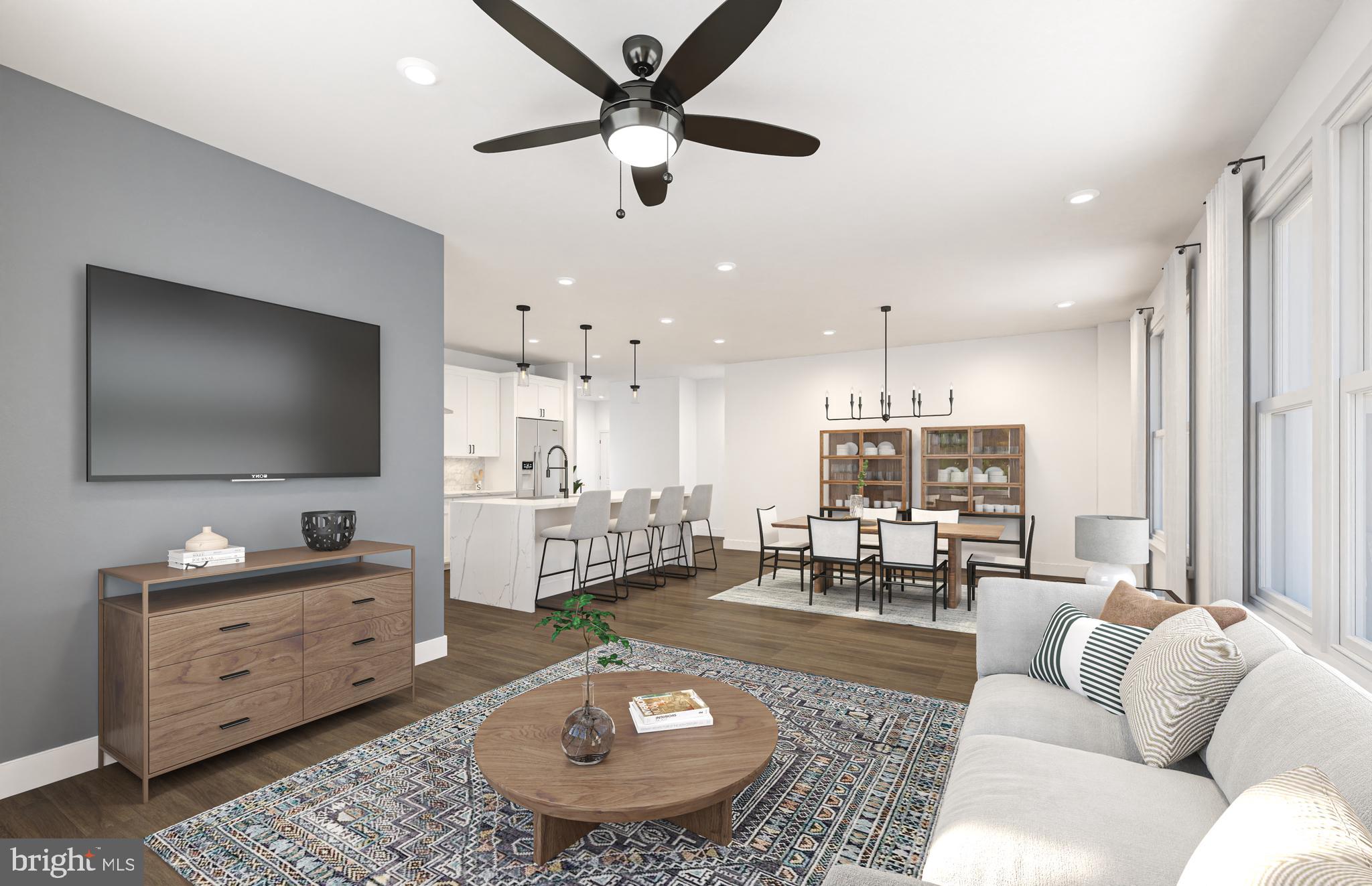1121 Fortune Terrace, Unit 1 Potomac, MD 20854 - Photo 12 of 12 a living room with furniture and a flat screen tv