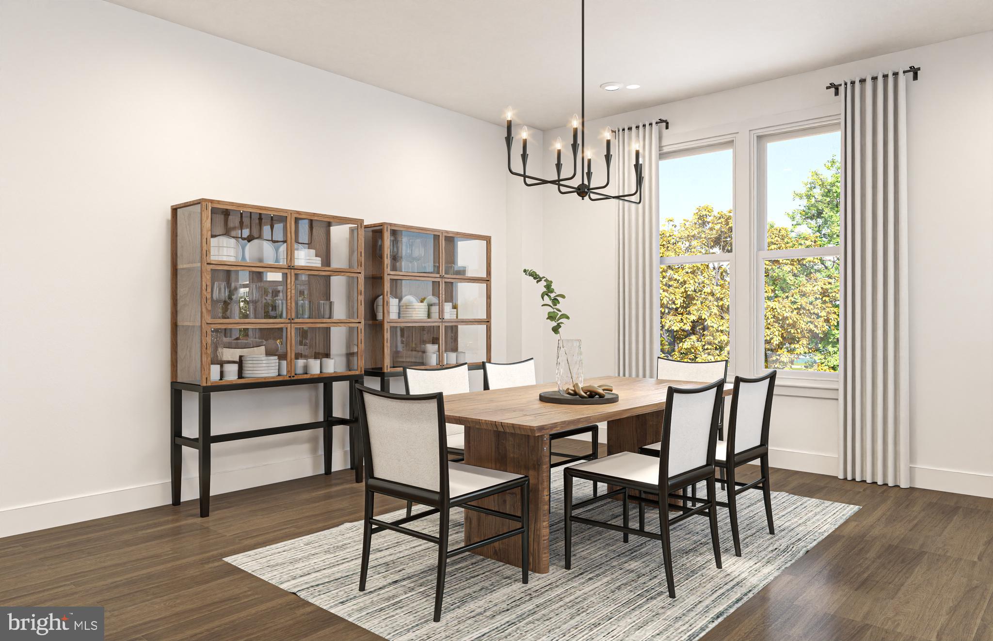 1121 Fortune Terrace, Unit 1 Potomac, MD 20854 - Photo 4 of 12 a view of a dining room with furniture window and wooden floor