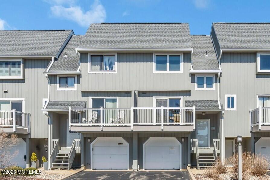 5 Island View Way, Unit 54 Sea Bright, NJ 07760 - Photo 1 of 1 a front view of a building with a balcony