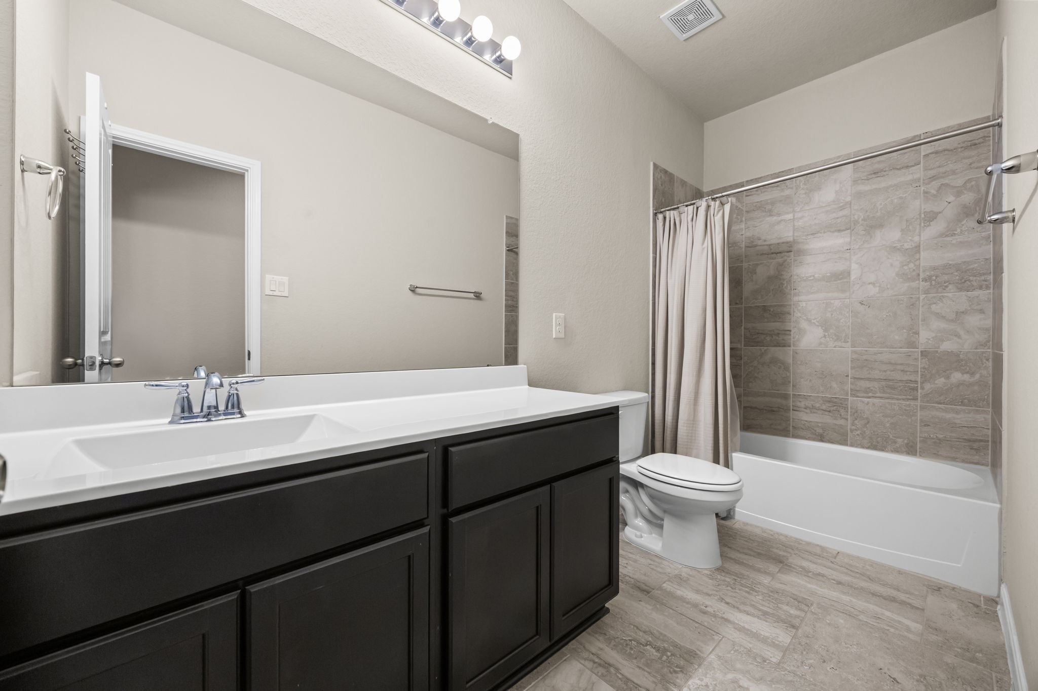519 Yellow Bullhead Court Rosenberg, TX 77469 - Photo 15 of 24 a bathroom with a sink a toilet and shower