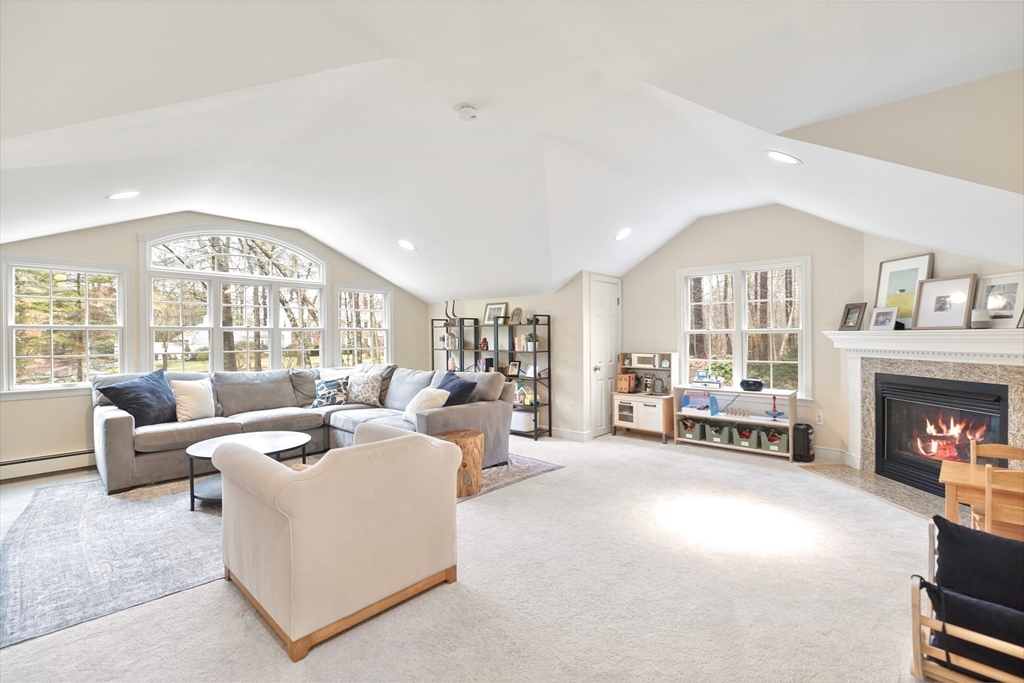 21 Batchelder Road Boxford, MA 01921 - Photo 11 of 37 a living room with furniture and a fireplace