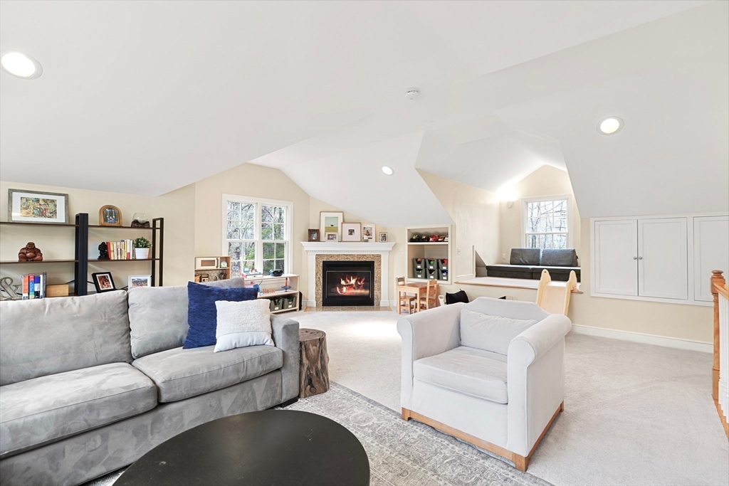 21 Batchelder Road Boxford, MA 01921 - Photo 12 of 37 a living room with furniture and a fireplace