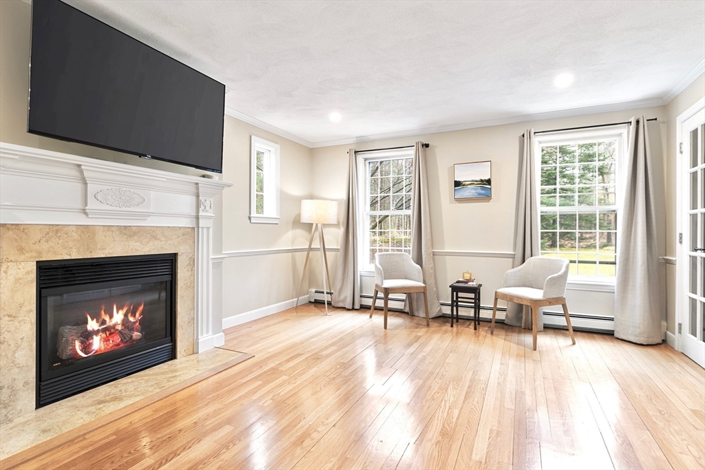 21 Batchelder Road Boxford, MA 01921 - Photo 15 of 37 a living room with furniture and a fireplace